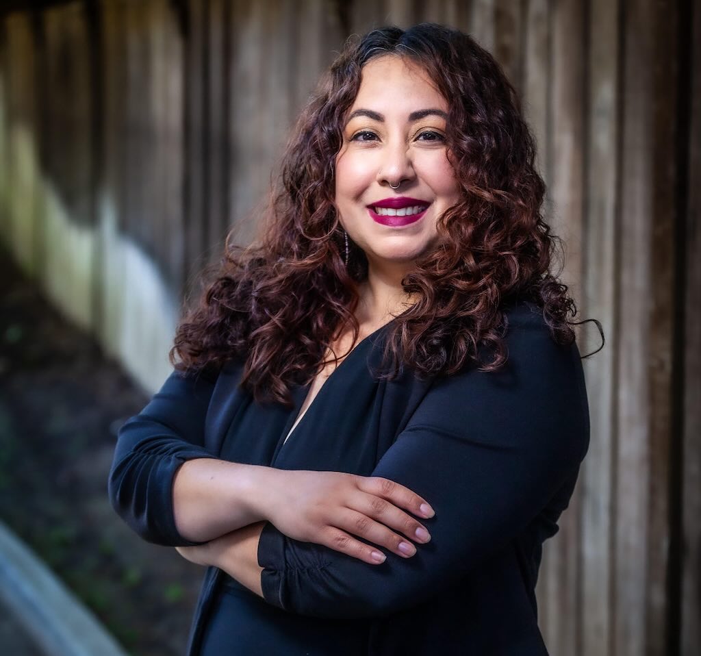 San Mateo Board of Supervisors District 2 candidate: Noelia Corzo Woman in a blue shirt smiles at the camera.