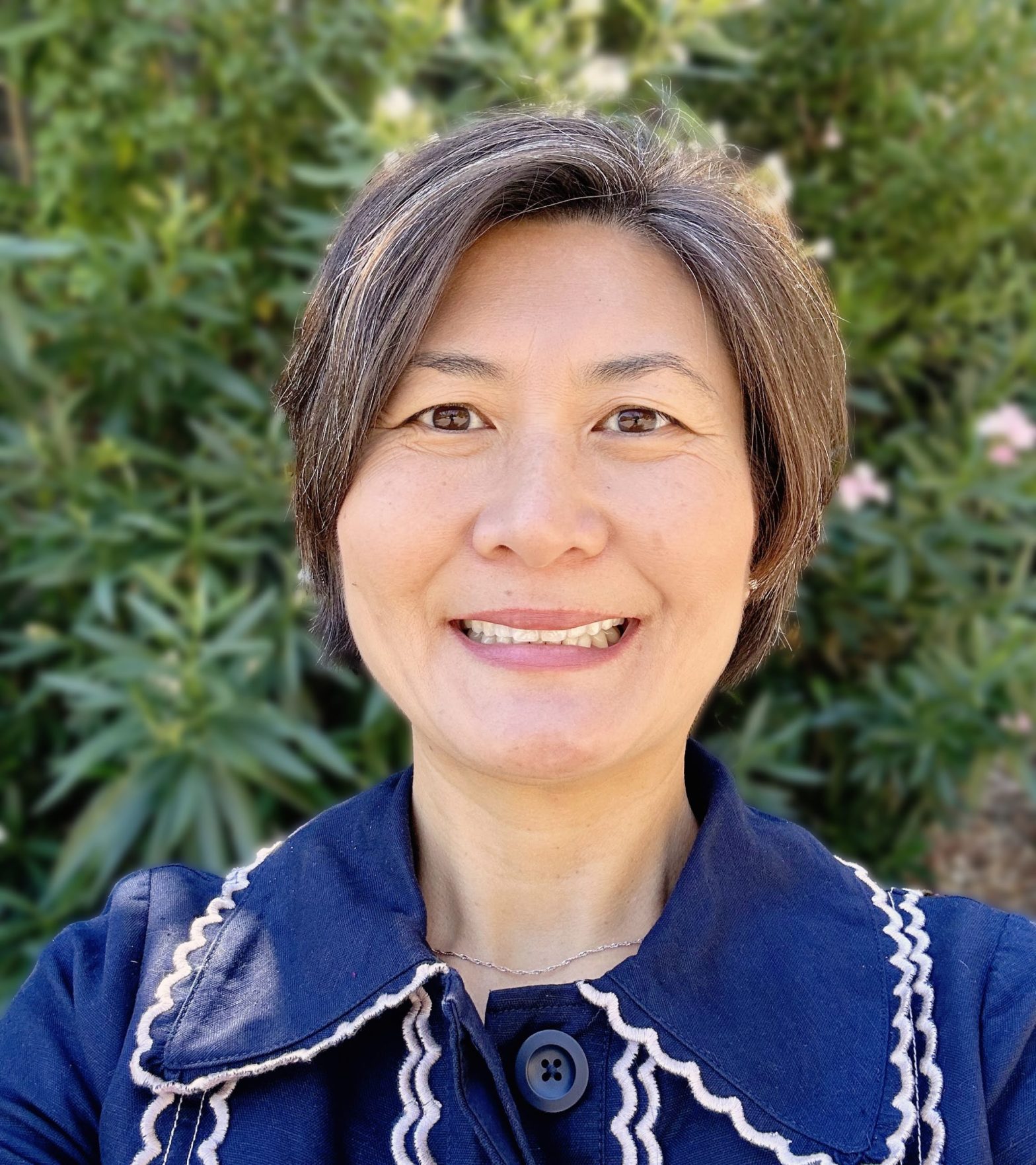 Larkspur City Council At Large: Stephanie Andre. Picture of woman smiling in blue top. Image credit: Stephanie Andre, used with permission