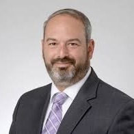 Steve Burdo for San Anselmo Town Council. Man in suit coat with light purple tie. Photo credit: Steve Burdo, used with permission
